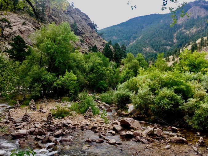 The art of rock stacking Boulder creek Colorado